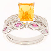 Yellow Citrine sterling silver ring with pink accents and sparkling details, a luxurious piece of jewelry.